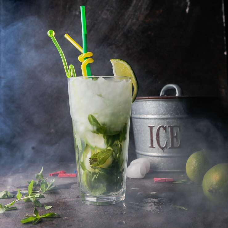 close-up-mojito-cocktail-with-mint-lime-ice-ice-bucket-with-smoke_176474-2447